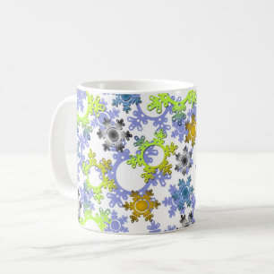 Cut paper snowflakes multicolored on white coffee mug