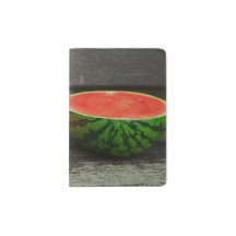 Cut Watermelon on Rustic Wood Background