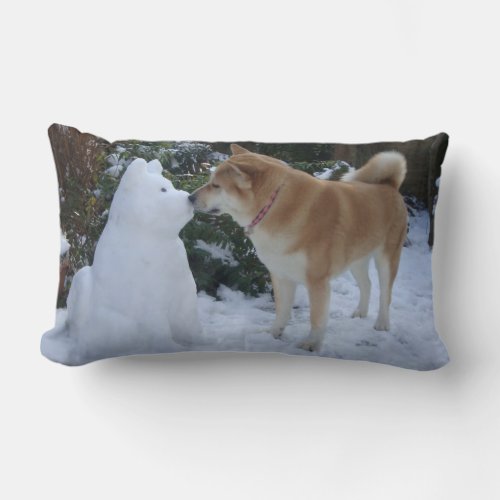 cute akita dog kissing snowman at christmas lumbar pillow