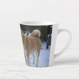 cute akita dog kissing snowman for christmas latte mug