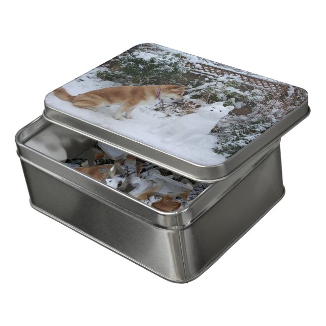 cute akita sitting in the snow with snowdog jigsaw puzzle (Lid Open)