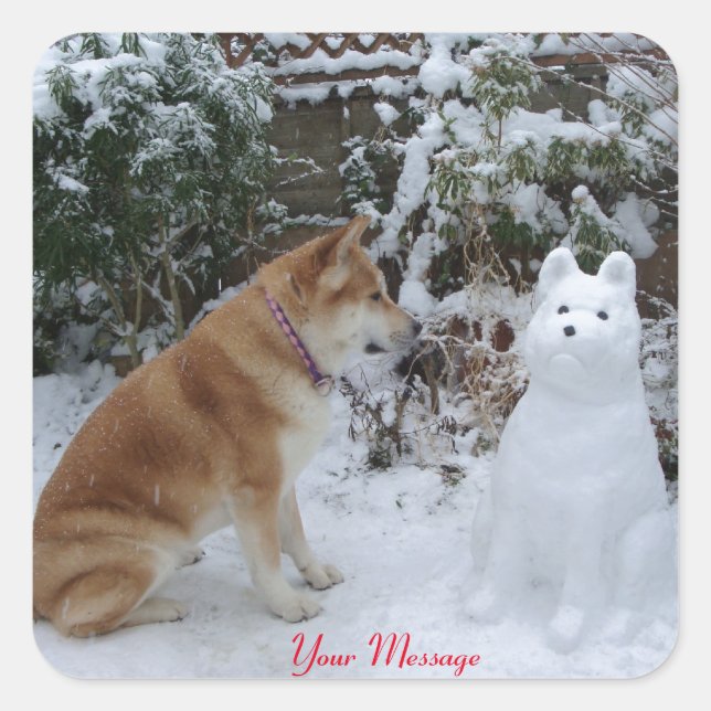 cute akita sitting with snowman in the snow dog square sticker (Front)