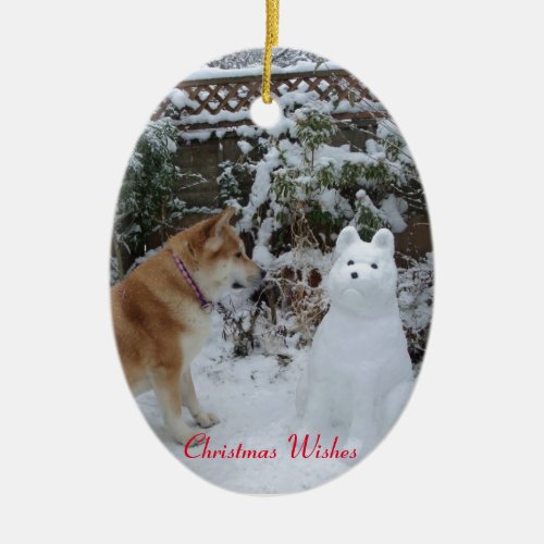 cute akita sitting with snowman snow dog ceramic ornament