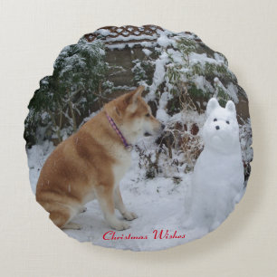 cute akita sitting with snowman snow dog round pillow