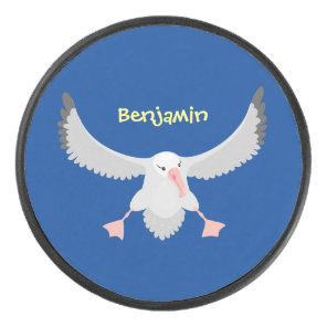 Cute albatross bird flying cartoon illustration hockey puck
