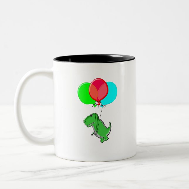 Cute And Angry Dino Flying With Party Balloons Two-Tone Coffee Mug (Left)