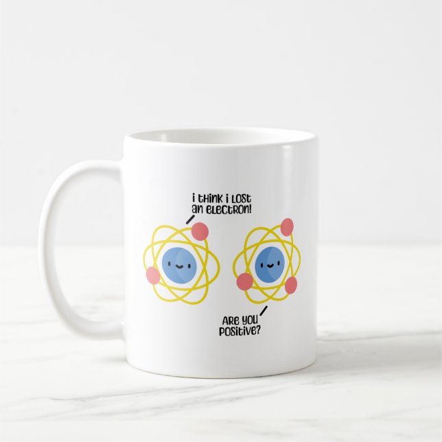 Cute And Funny Atom Science Joke Pun Coffee Mug (Left)