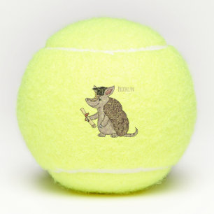 Cute armadillo with graduation cap cartoon tennis balls