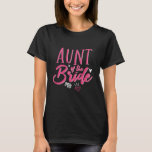 Cute Aunt of The Bride Pink Calligraphy Script T-Shirt<br><div class="desc">Vintage cursive calligraphy script font design for engagement party, rehearsal dinner, bridal shower or bachelorette party. Matching wedding merchandise for the bride, her family and friends. Bright pink color for a fun night out with the bride, maid of honor, bridesmaid, bestfriends and the whole wedding crew. Celebrate being engaged and...</div>