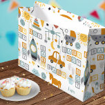 Cute Baby Boy Car Toy Pattern and Name Baby Shower Large Gift Bag<br><div class="desc">Add a cute custom touch to your newborn's baby shower with this adorable baby boy gift bag. Gift bag has a colorful pattern of a sun, moon, stars, baby carriage, toys, rocket ship, car, rocking horse, and more. Blocks spell out Baby Boy and there's a place to add the first...</div>
