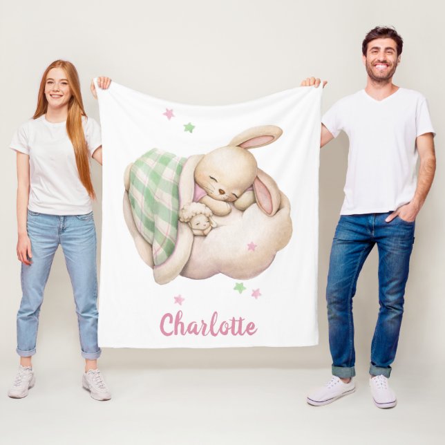 Cute baby girl bunny sleeping on a cloud fleece blanket (In Situ)