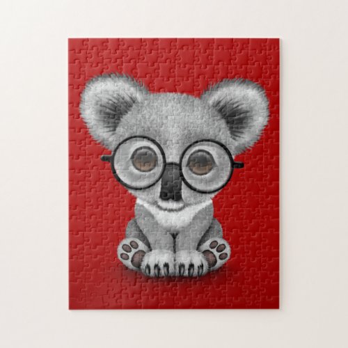 Cute Baby Koala Bear Cub Wearing Glasses on Red Jigsaw Puzzle