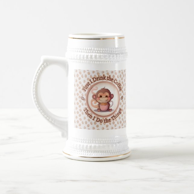 Cute baby monkey holds a steamy hot coffee beer stein (Left)