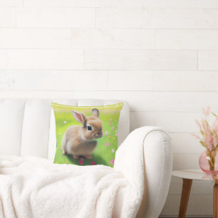 Cute baby rabbit in a flower meadow throw pillow