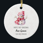 Cute Baby's First Christmas Winter Snowman  Ceramic Ornament<br><div class="desc">Cute Baby's First Christmas Winter Snowman Ceramic Ornament Celebrate your little one's first holiday season with our Cute Baby's First Christmas Winter Snowman Ceramic Ornament. This adorable ornament features a charming snowman design, perfect for commemorating a special milestone. Crafted from high-quality ceramic, it includes a festive illustration of a snowman...</div>