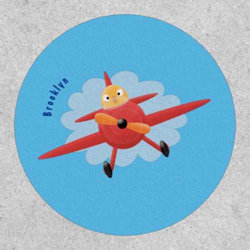 Cute bird flying red airplane cartoon illustration patch