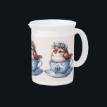 Cute Bird in Floral Teacup Cottagecore Art Beverage Pitcher<br><div class="desc">This charming artwork features an irresistibly cute bird nestled snugly in a delicate floral teacup, crowned with a wreath of blue and pink blossoms. The design blends soft pastel tones with vintage-inspired patterns, creating a serene and cozy woodland vibe. Perfect for lovers of cottagecore and springtime whimsy, the scene evokes...</div>