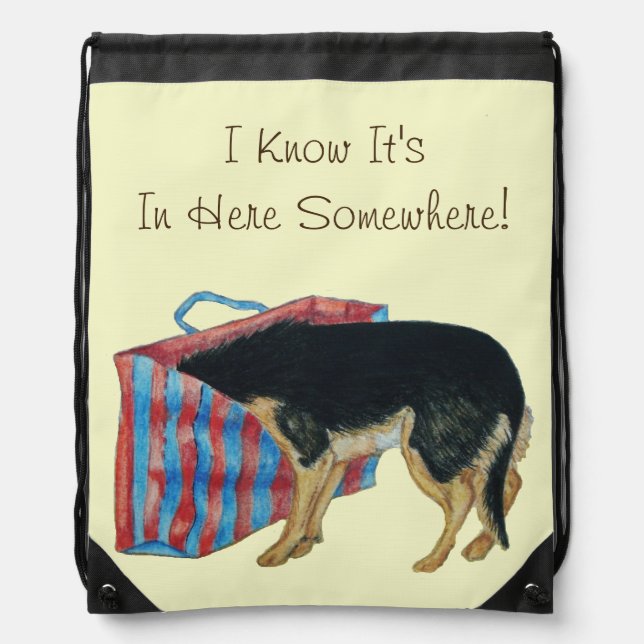 Cute black and tan dog with head in bag (Front)