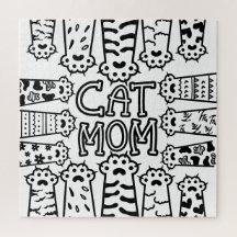 Cute Black and white cat mom with cat paws