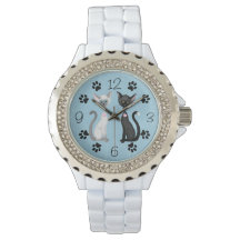 Cute Black and White Cats with Paw Prints on Blue