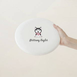 Cute black and white husky dog Wham-O frisbee