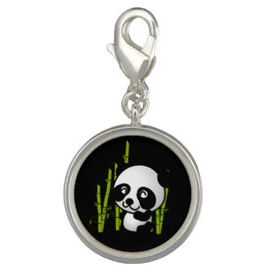 Cute black and white panda bear in a bamboo grove. charm