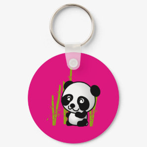 Cute black and white panda bear in a bamboo grove. keychain