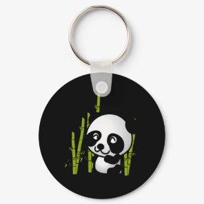 Cute black and white panda bear in a bamboo grove. keychain