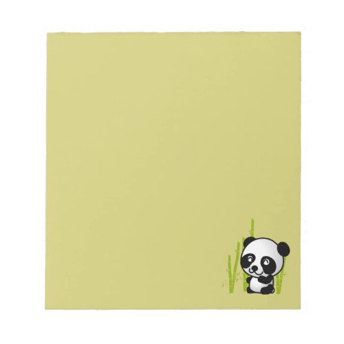 Cute black and white panda bear in a bamboo grove notepad