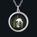 Cute black and white panda bear in a bamboo grove. silver plated necklace<br><div class="desc">What a cute and adorable illustration of a black and white panda bear sitting amongst the green bamboo stalks in a little grove,  looking happy,  friendly and lovable. Black background really makes this little panda pop!</div>