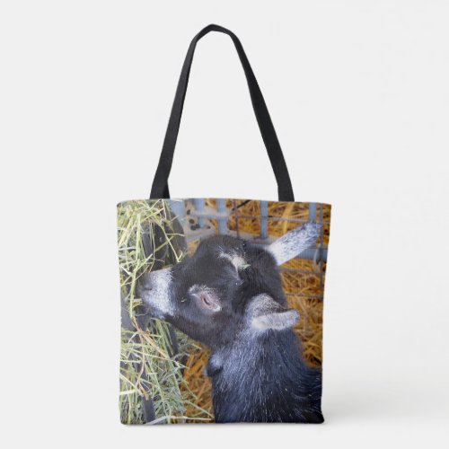 Cute Black Baby Goat Eating Hay Photo Tote Bag