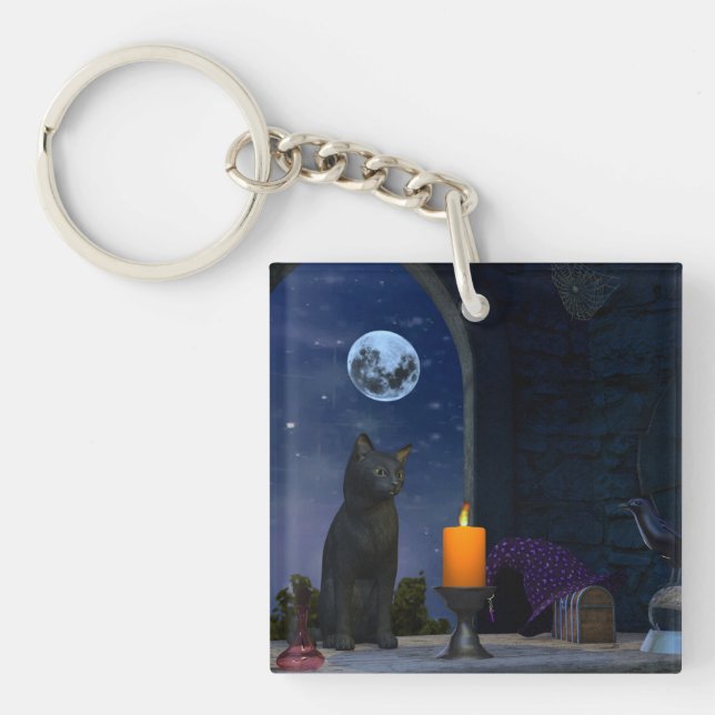 Cute Black Cat Staring at a Candle Keychain (Front)