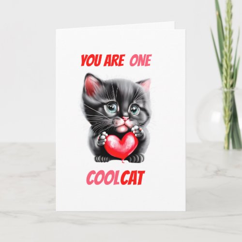 Cute black kitten holding red heart cool cat holiday card