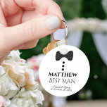 Cute Black Tie Tuxedo Best Man Wedding Favor Keychain<br><div class="desc">This fun keychain is designed as a gift for your Best Man. Features a cute mock tuxedo design with a black bow tie and buttons on a white background. The text reads "Best Man" and has a place for his name along with the names of the wedding couple and the...</div>