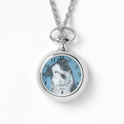 cute border collie dog with blue teddy bear watch