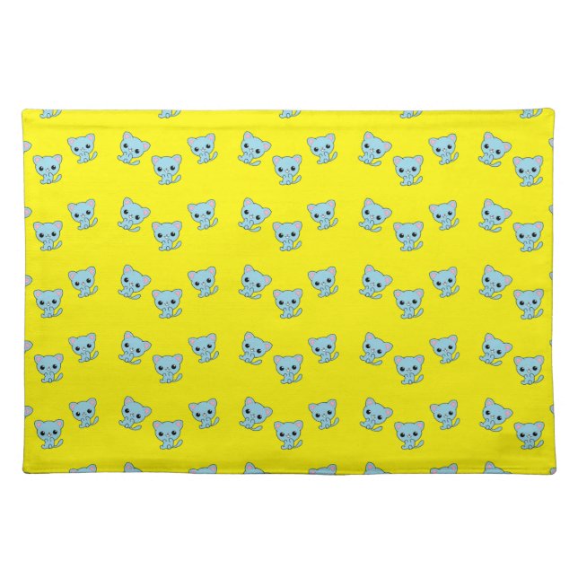 Cute bouncy blue kitten on yellow cloth placemat (Front)