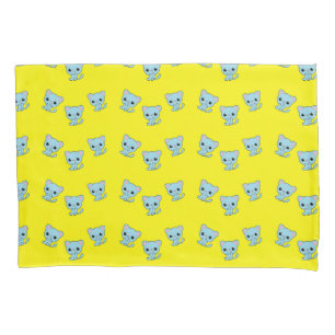 Cute bouncy blue kitten on yellow pillow case