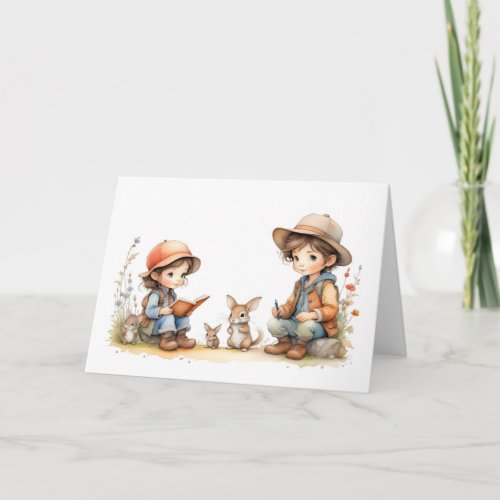 Cute Boy and Girl Reading Book Rabbits Flowers Card
