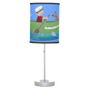 Cute boy sailor and dog rowing boat cartoon table lamp