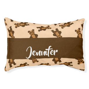 Cute brown bear on pink pet bed