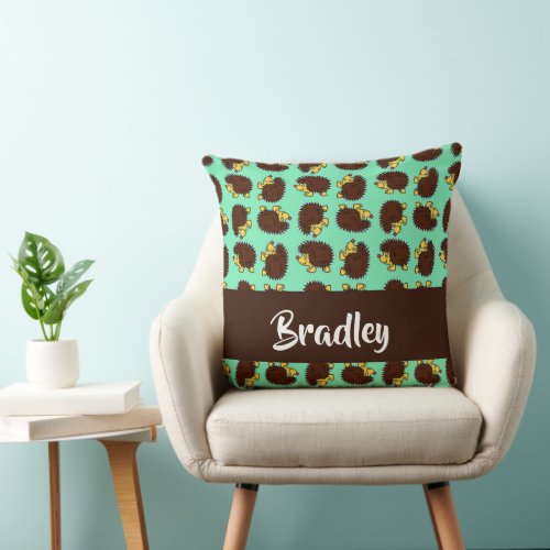 Cute brown hedgehogs on blue throw pillow