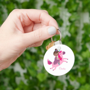 Cute Brunette Haired Girl Riding on a Unicorn Keychain