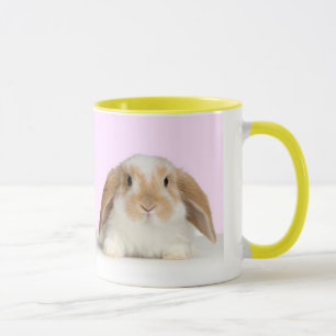 Cute bunny on a yellow-edged mug