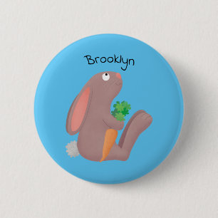 Cute bunny rabbit sitting with carrot cartoon button