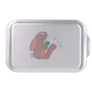 Cute bunny rabbit sitting with carrot cartoon cake pan