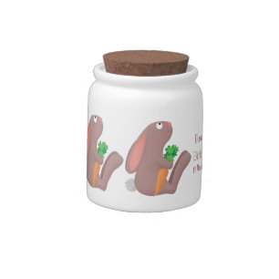 Cute bunny rabbit sitting with carrot cartoon candy jar