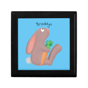Cute bunny rabbit sitting with carrot cartoon gift box