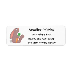 Cute bunny rabbit sitting with carrot cartoon label