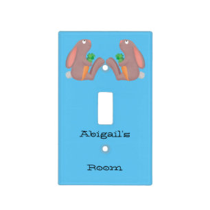 Cute bunny rabbit sitting with carrot cartoon light switch cover