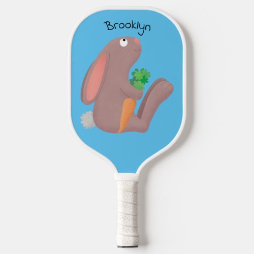 Cute bunny rabbit sitting with carrot cartoon  pickleball paddle